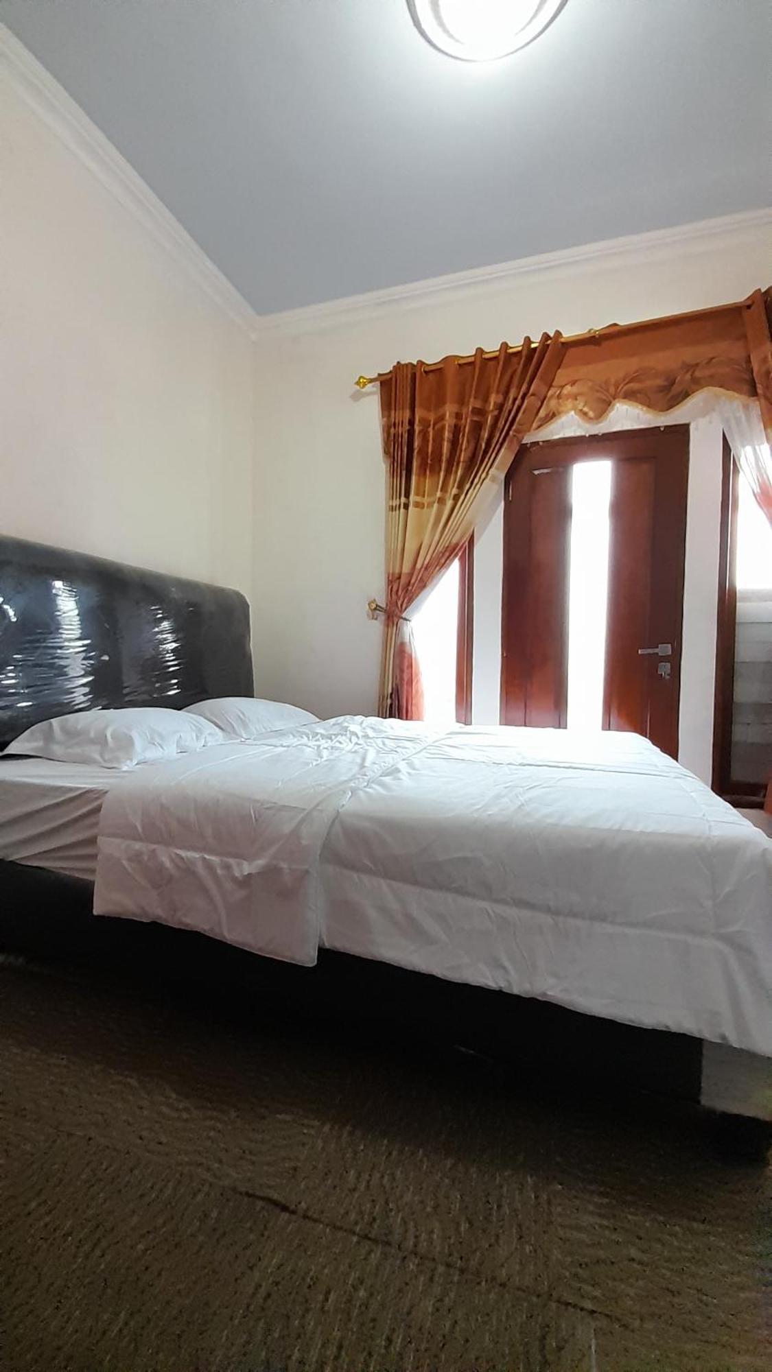 Merpati Dieng Syariah Redpartner Homestay